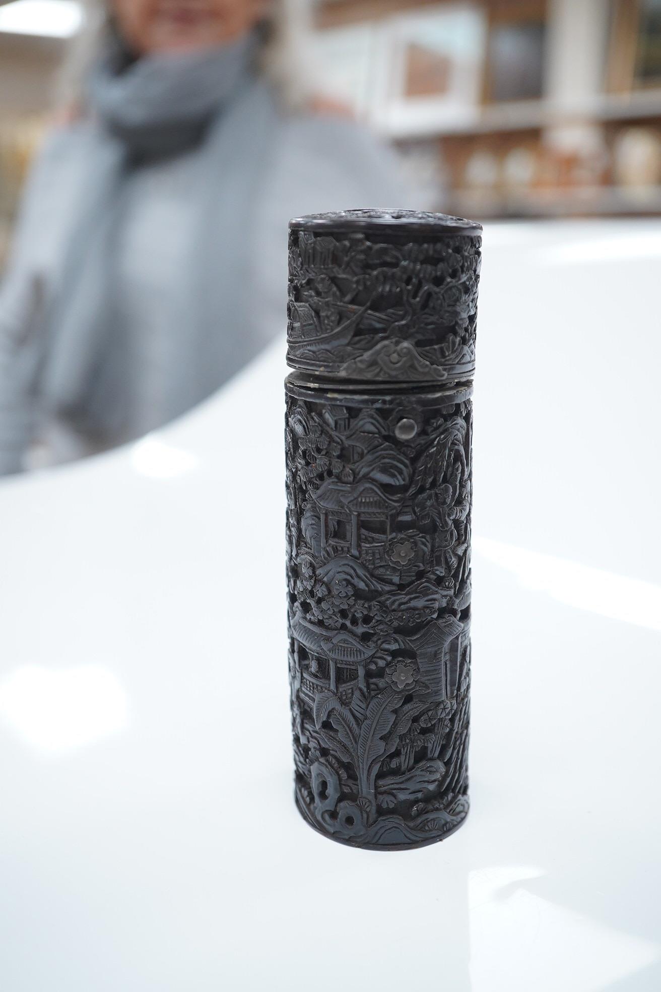 An early 19th century Chinese export carved tortoiseshell ovular box, with inscribed plaque to the lid, 13cm high. Condition - lid broken